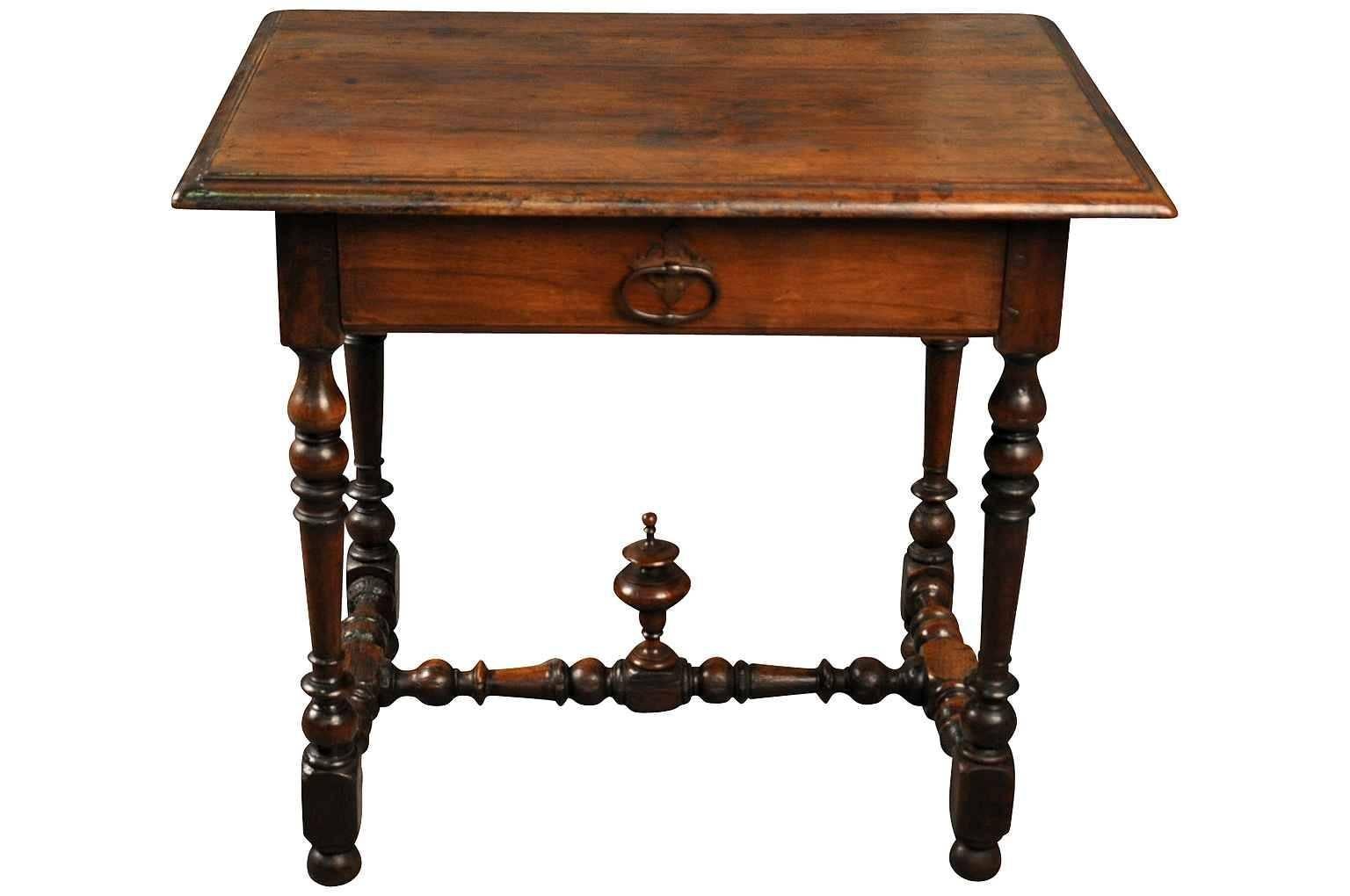 A very charming later 19th century French Louis XIII style side table. Beautifully constructed in walnut with one drawer and nicely turned legs. Perfect as a bedside table as well.