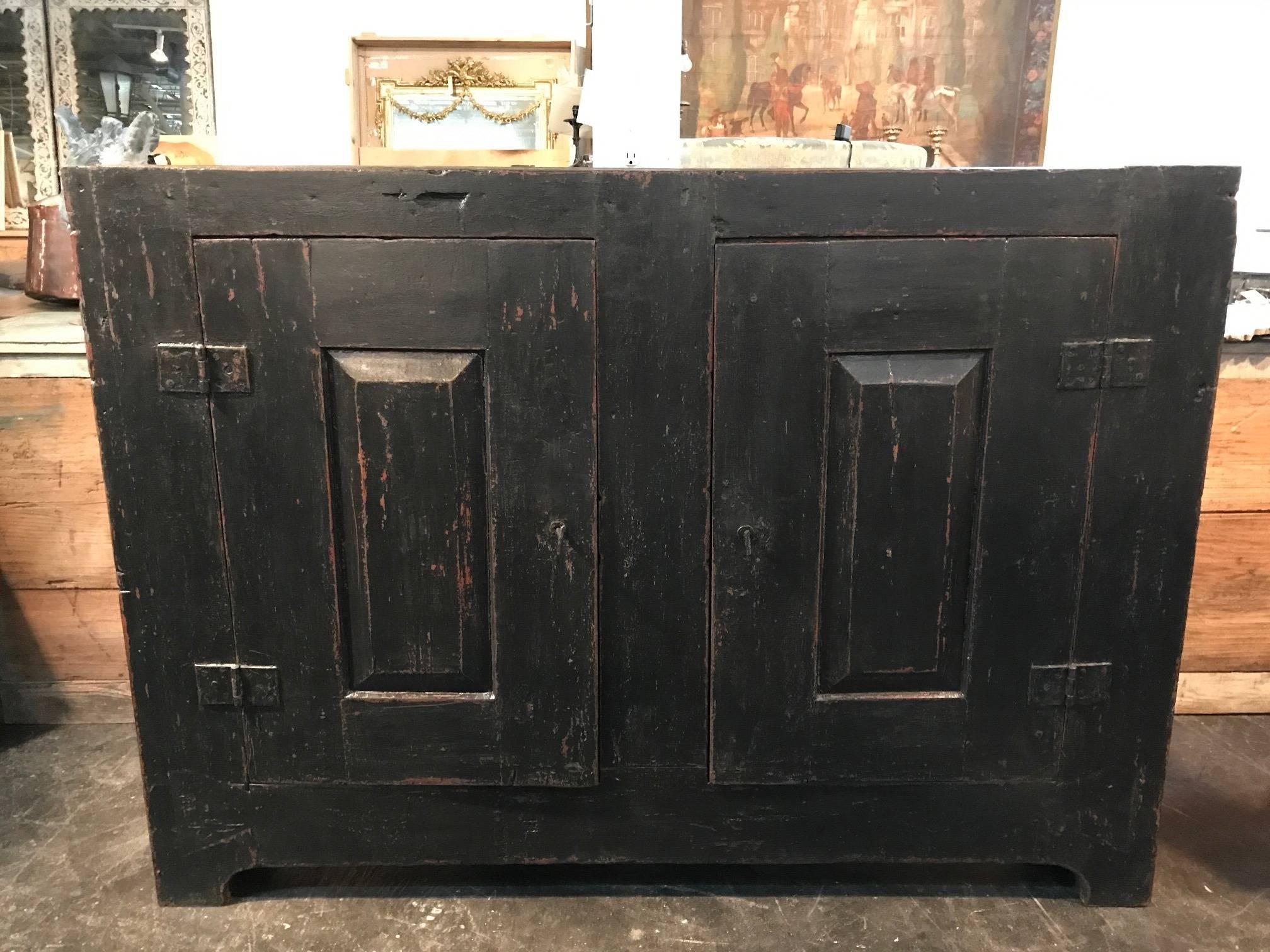 A sensational Primitive 17th century buffet from the Catalan region of Spain. Wonderfully constructed with very thick planks. Terrific patina and finish.