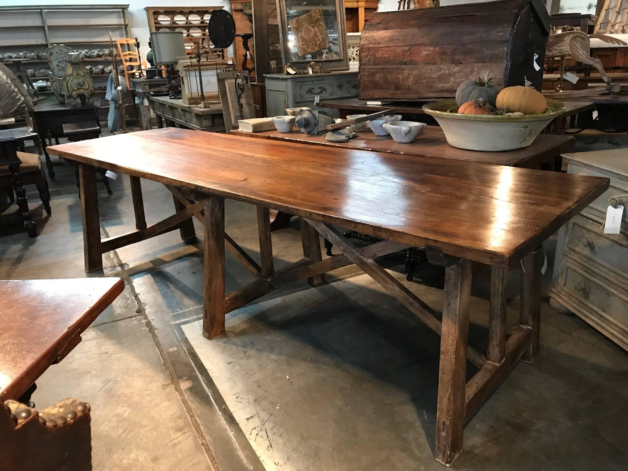 A sensational mid-18th century farm table from the Catalan region of Spain. Wonderfully and soundly constructed from walnut with an outstanding solid board top. The table's clean and minimalist lines lend this piece a very contemporary feel.