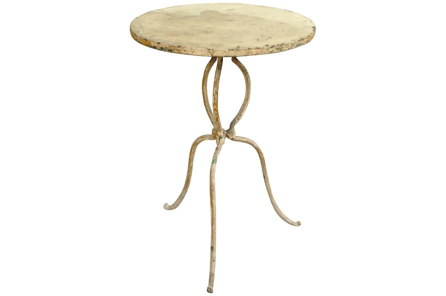 A very charming later 19th century garden gueridon - bistro table from the Provenance region of France. Wonderfully made from painted iron. Especially nice is the table's diminutive size. A lovely piece for any interior or garden.