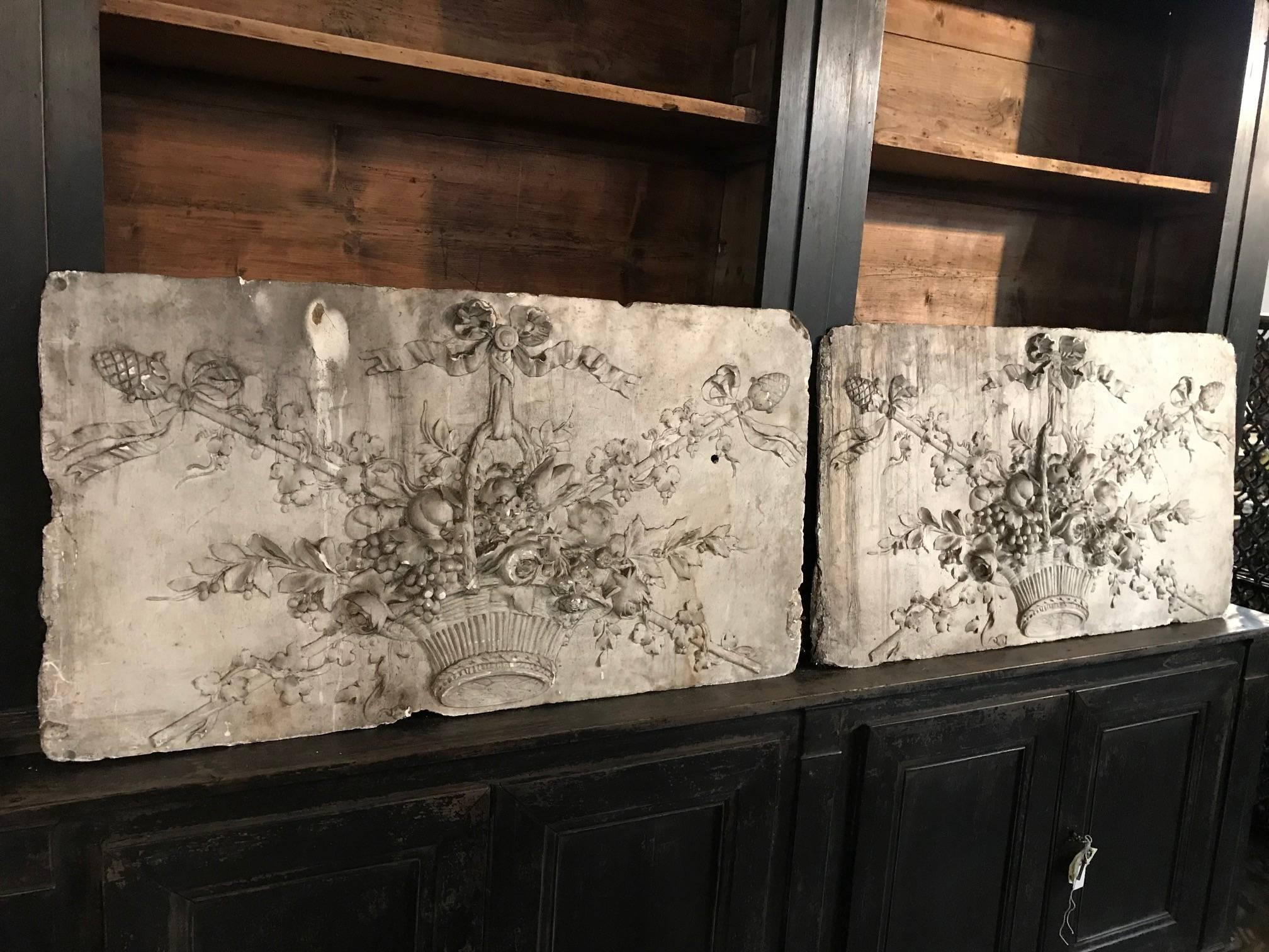 A stunning pair of French Louis XVI style boiserie panels in plastered wood. Wonderful art pieces from the Loire Valley region of France. Beautiful to frame.