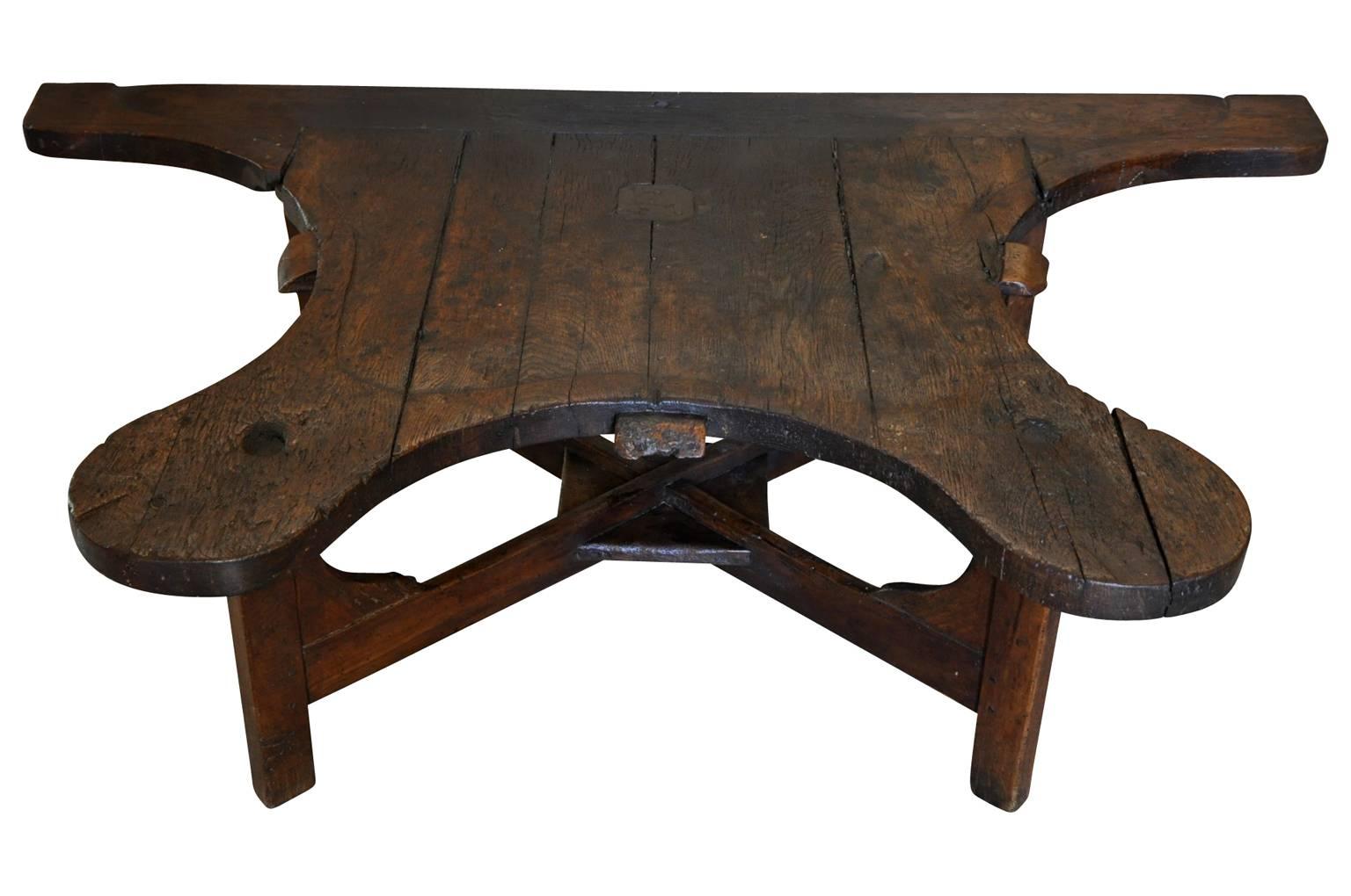 A very charming and Primitive 18th century French Jeweler's work bench - converted into a coffee table. A terrific piece to add character to a casual living area.