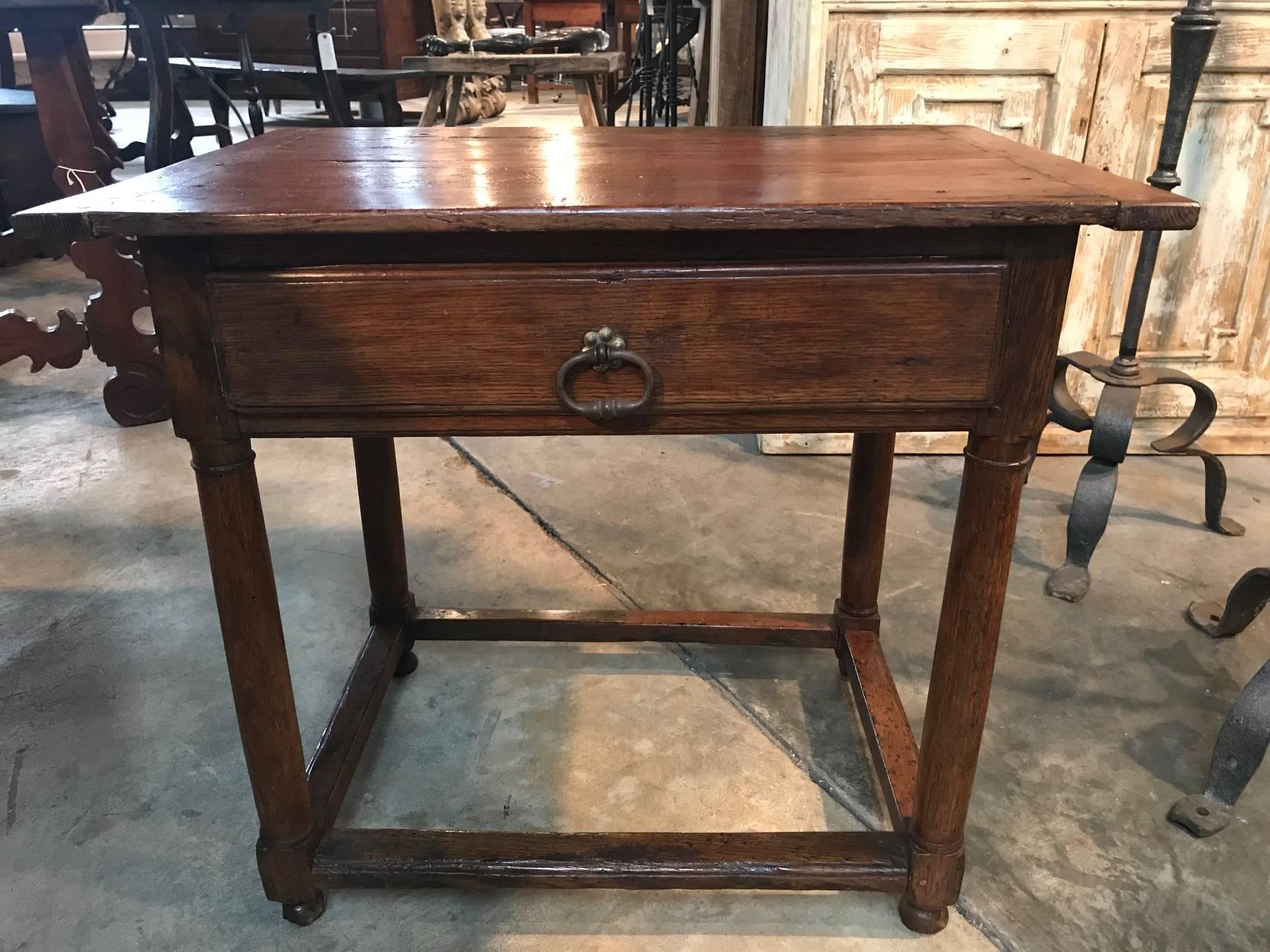 A very beautiful early 19th century side table from the Provence region is France. Wonderfully constructed from chestnut - with baluster shaped legs and a single drawer. Terrific patina.