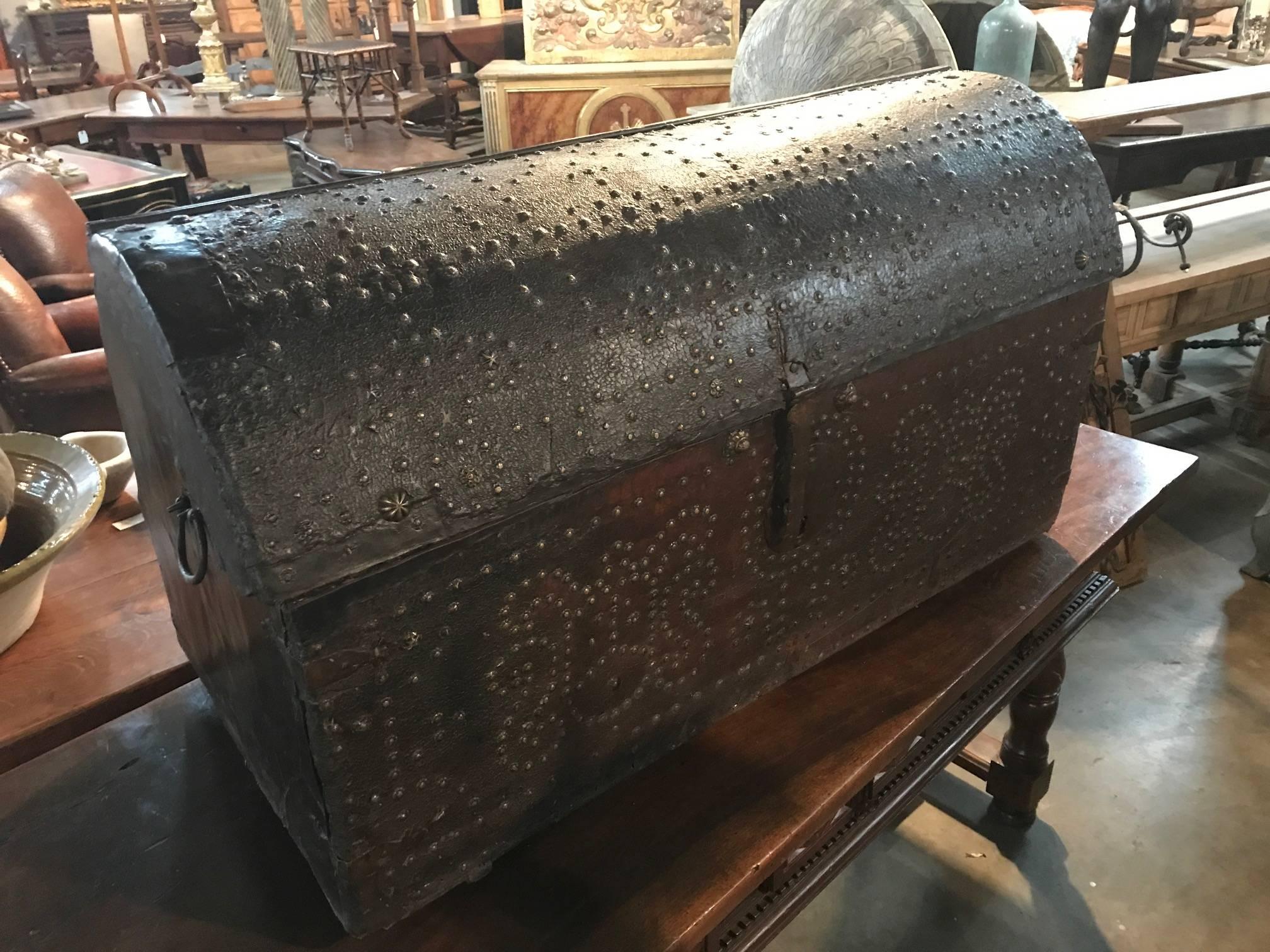 An outstanding 17th century marriage trunk Malle from the South of France. Wonderfully constructed from wood enveloped with richly patina'd leather. The bronze and iron hardware fittings are sensational. Perfect at the base of a bed, or under a