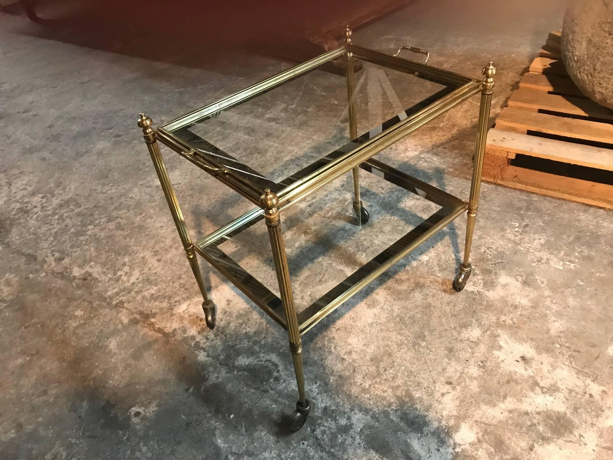 A very handsome midcentury Italian cocktail cart in brass, glass and mirror. The tray is removable. The glass is nicely trimmed with a mirrored band.