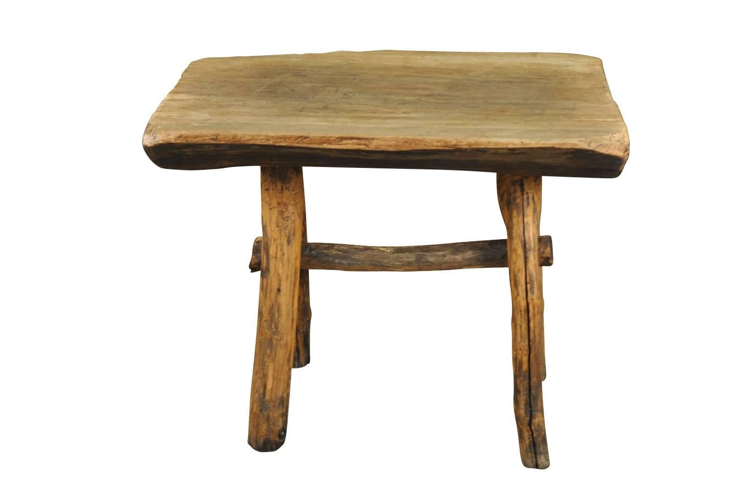 A very charming and rustic wooden bistro table from the Catalan region of Spain. A terrific accent piece for any casual environment, lake house or mountain lodge.