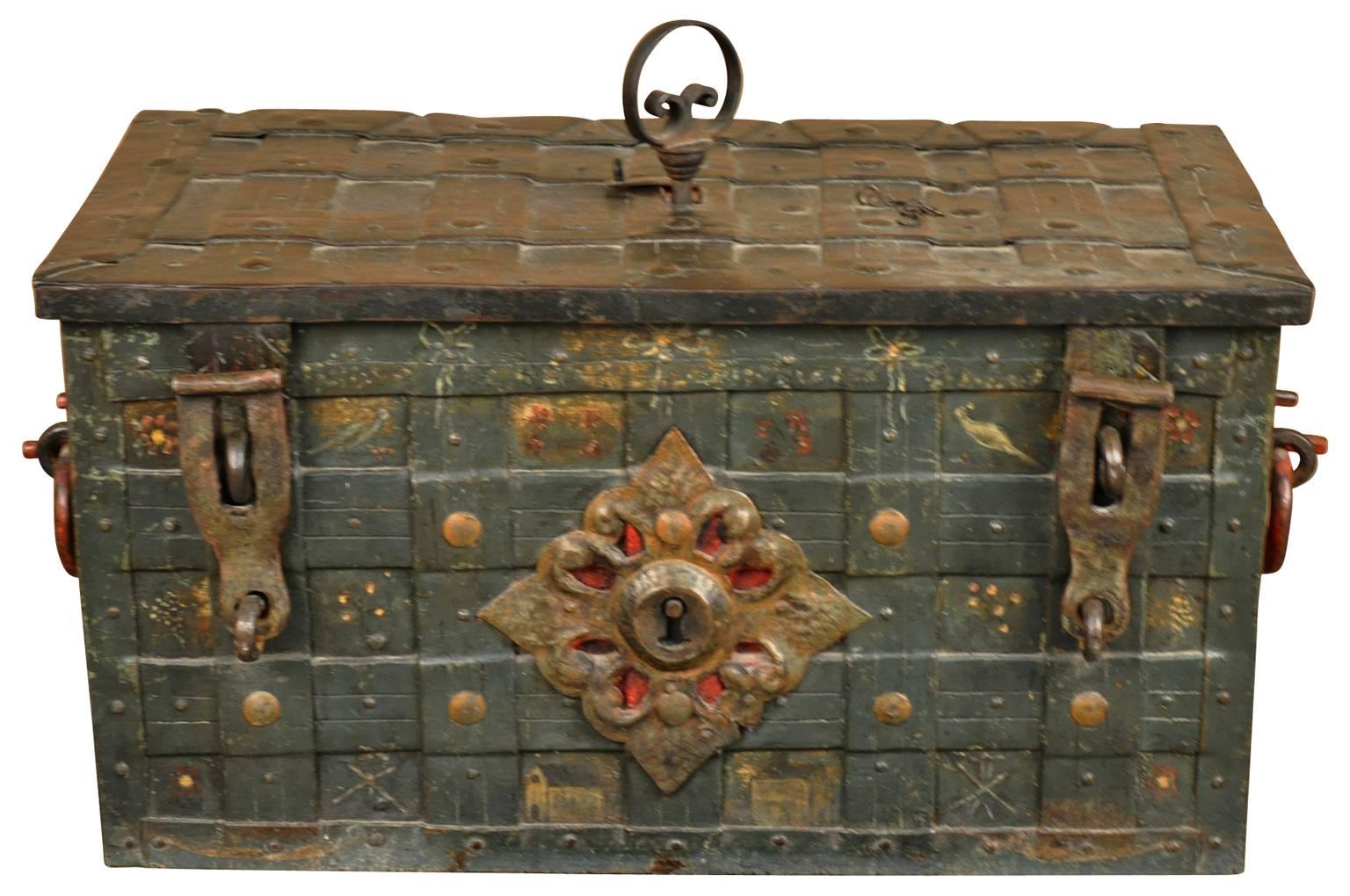 A very striking early 18th century Coffre Forte - Safe - from Nuremberg, Germany. Masterly crafted from iron, decorated with colloquial motifs. A fabulous piece to serve as a coffee table or end table.