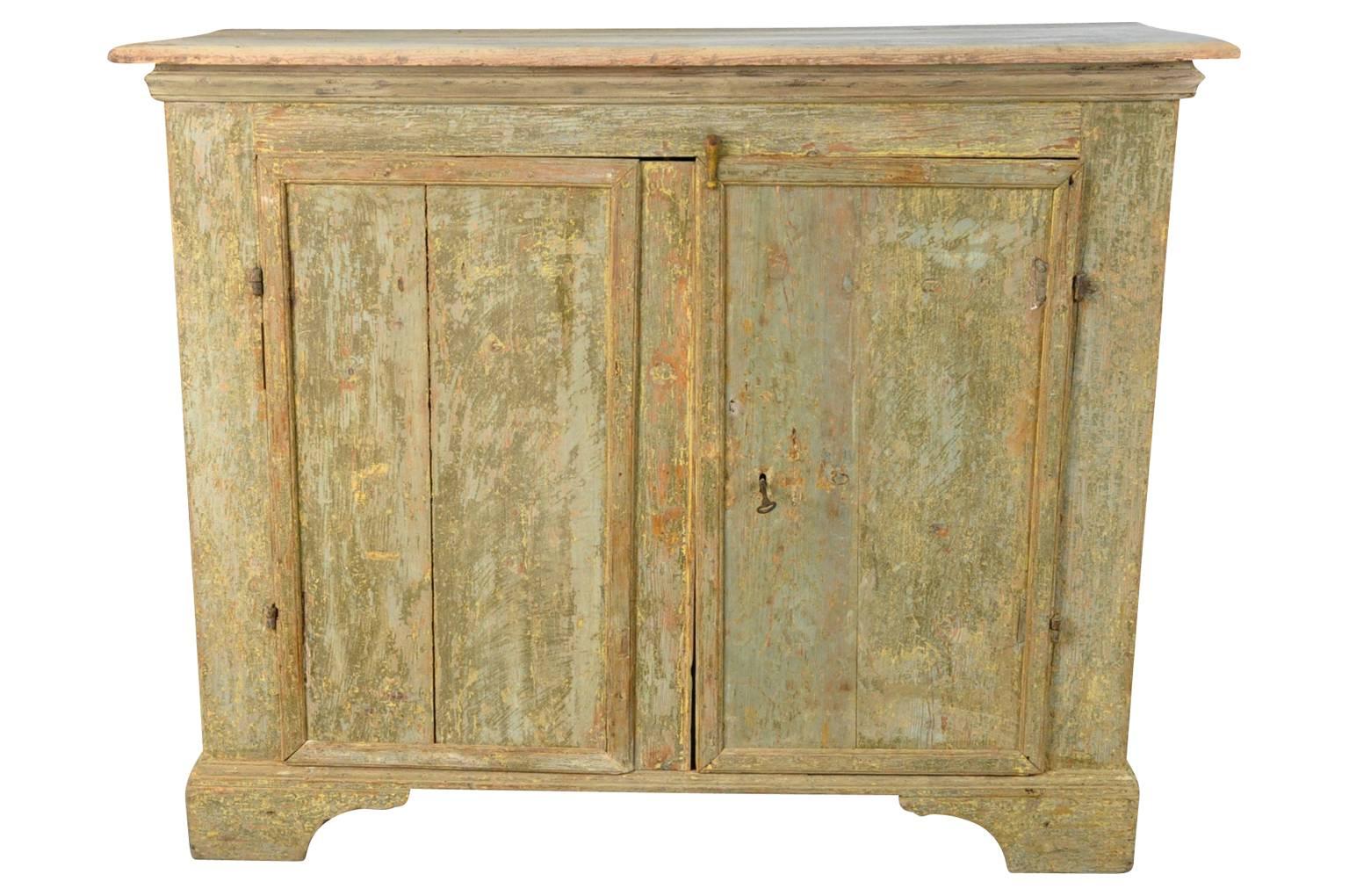 A very charming later 18th century primitive buffet from the Provence region of France. Very soundly constructed with a wonderful and refreshing painted finish.