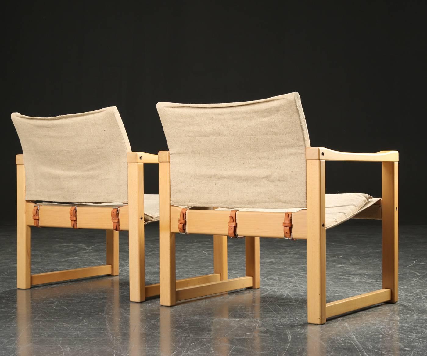 Safari style beech armchairs in Linen seats/backs/cushions with leather straps by Karin Mobring for Olaio Portugal, model 