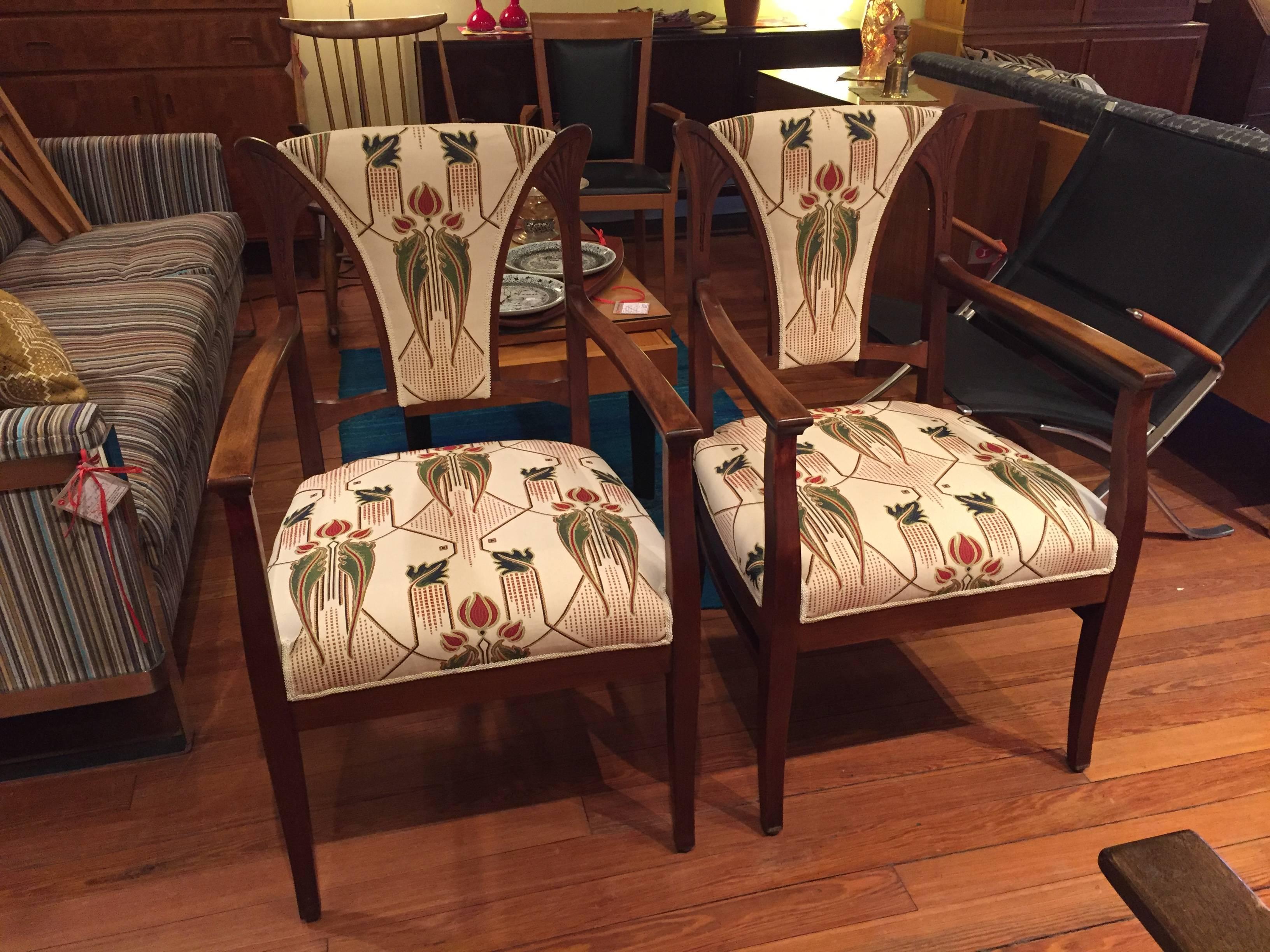 Pair of mahogany armchairs with Art Nouveau carving. New John Lewis upholstery.
