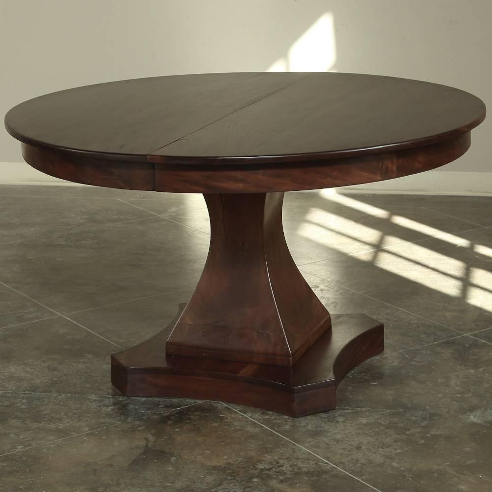Amazing Mahogany Pedestal Louis Philipe Round Dining Center Table by day, and a Large Dining Table to seat eight by night! This versatile 19th century pedestal dining table features tailored lines and a circular top that splits apart to accommodate