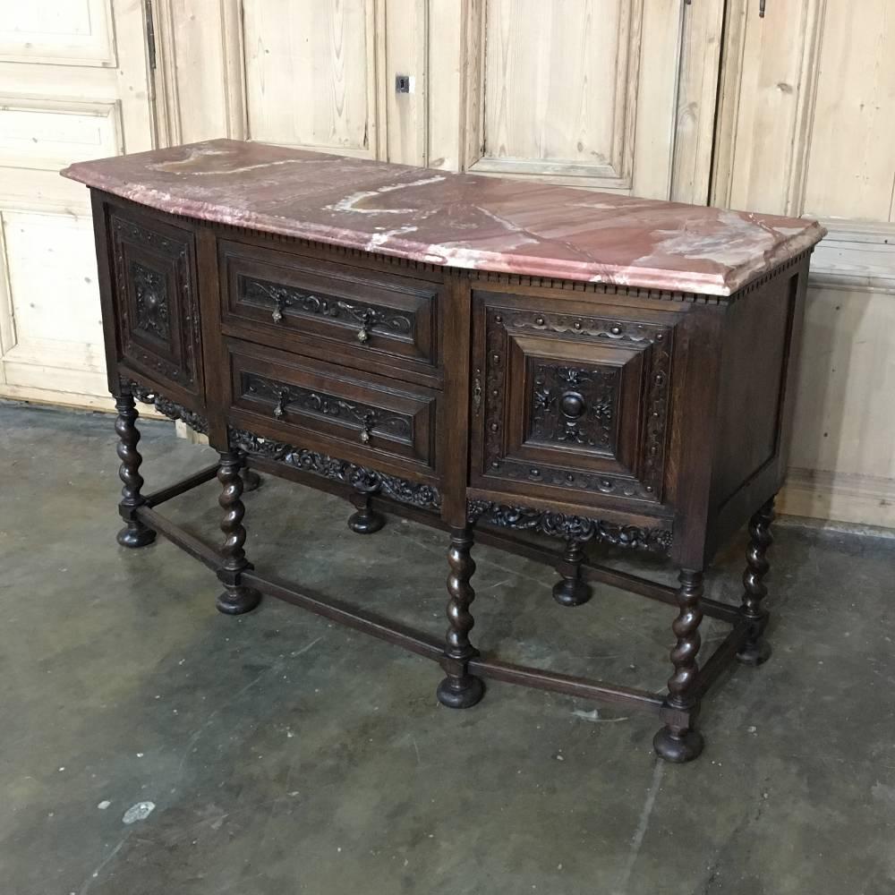 This antique Renaissance raised buffet with jasper top is a departure from the normal marble top, with the natural and colorful beauty of the Jasper stone adding lovely yet somewhat muted jewel tones to the visual impact. Raised upon legs connected