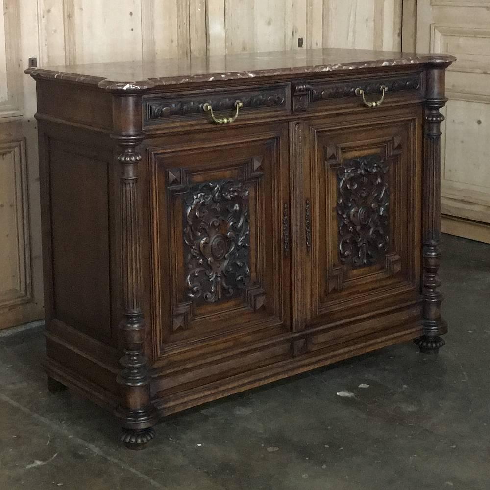 This stately 19th century French Louis XIV walnut marble top buffet makes the ideal choice for any room in the home or office, with timeless hand-carved detail, the luxury of sumptuous French walnut, and a carefree yet elegant marble top,