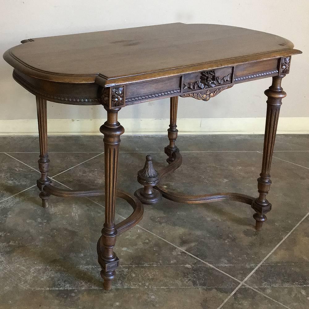 Sculpted from exquisite French walnut, this handsome 19th century French neoclassical end table can also easily double as a writing table for today's laptops, as a drawer is no longer needed for stationery and the like! Tapered and fluted column