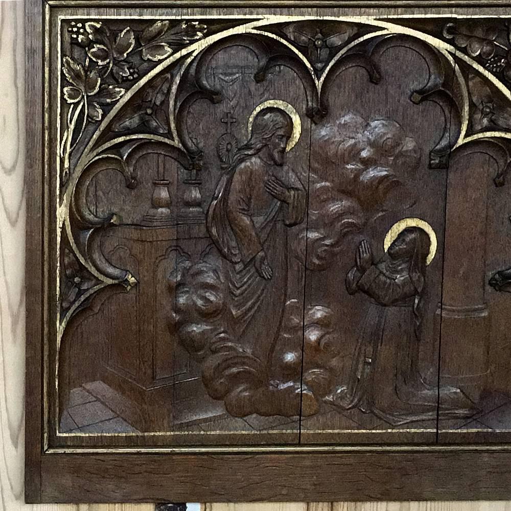 Inspiring 19th century religious carved oak panel in the Gothic style with gold highlighting depicts Jesus appearing after the Resurrection,
circa 1860s.
Measures: 24 H x 26 W.