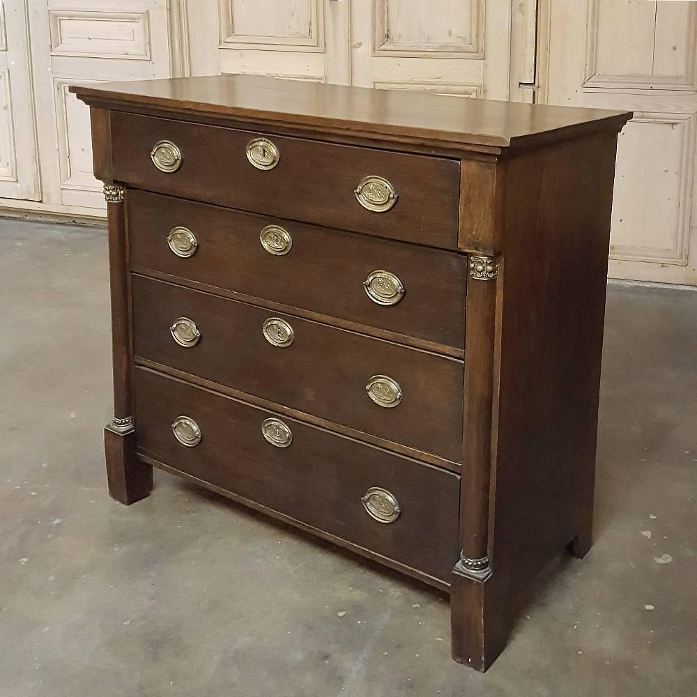 Emulating the style precedents set forth by the court, this 19th century Rustic Empire Commode was handcrafted by able rural artisans duplicating the look with more rudimentary tools, making their efforts all the more charming! Fashioned from