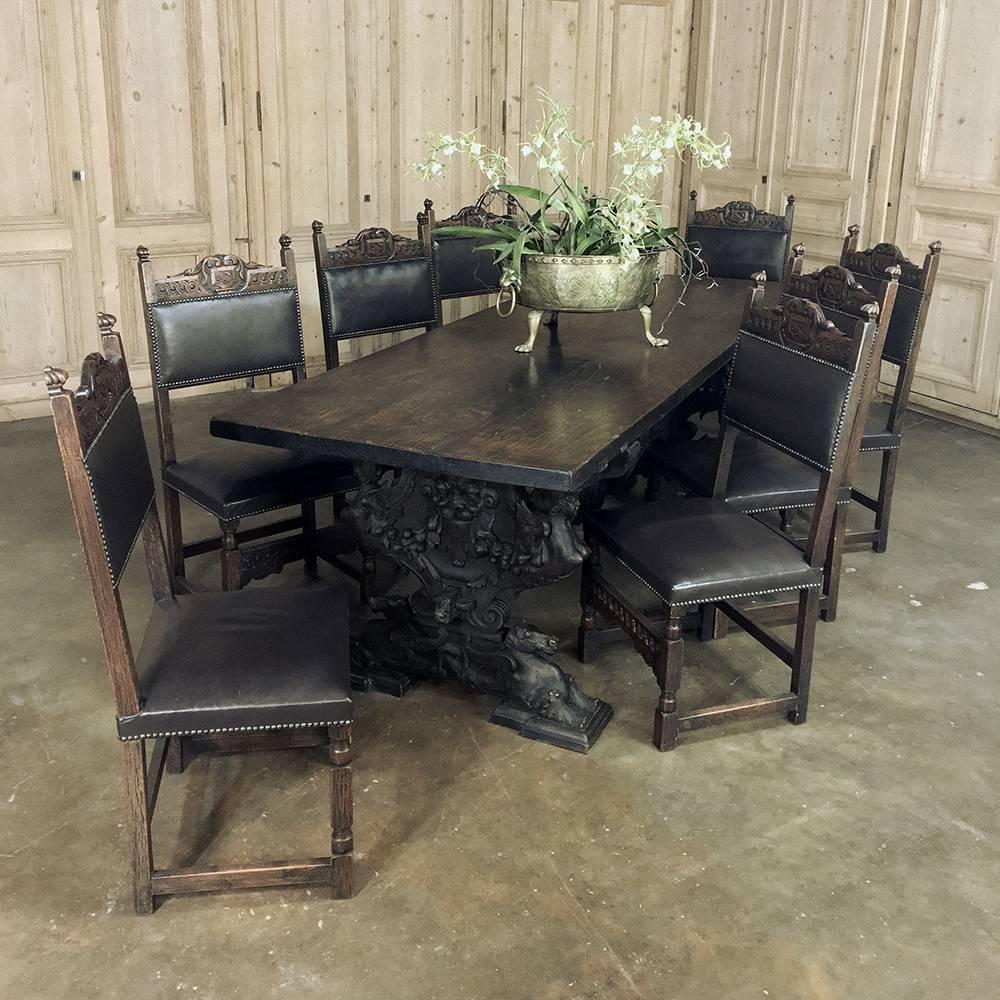 This spectacular example of 17th century hand-carved Italian sculpture also makes a stunning antique dining table! Sculpted with winged horses and angels, it is also adorned with floral garlands and scrollwork that rivals the ancient masters of