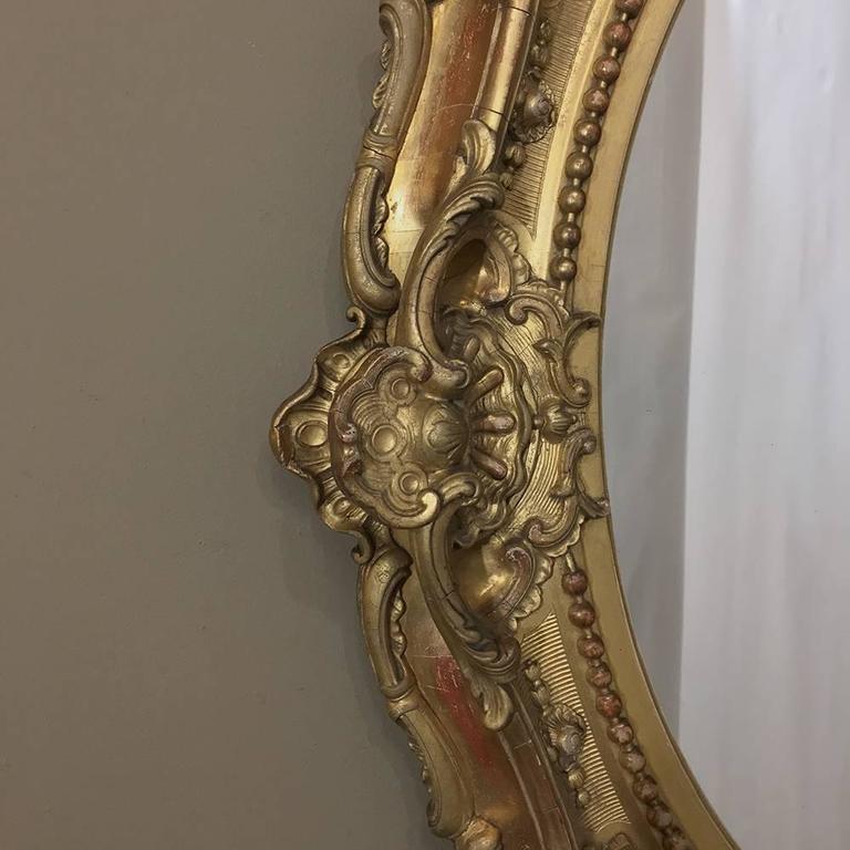 19th Century Gilded Baroque Oval Mirror For Sale at 1stDibs