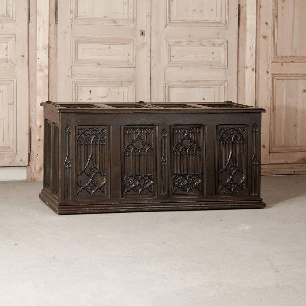 Hand-crafted during the days of the revival of the style in 19th century Europe, this Antique Oak Gothic Trunk makes a great choice for the foot of the bed, hallway, or coffee table!
Circa 1880s
Measures 26 H x 53 W x 20.5 D.