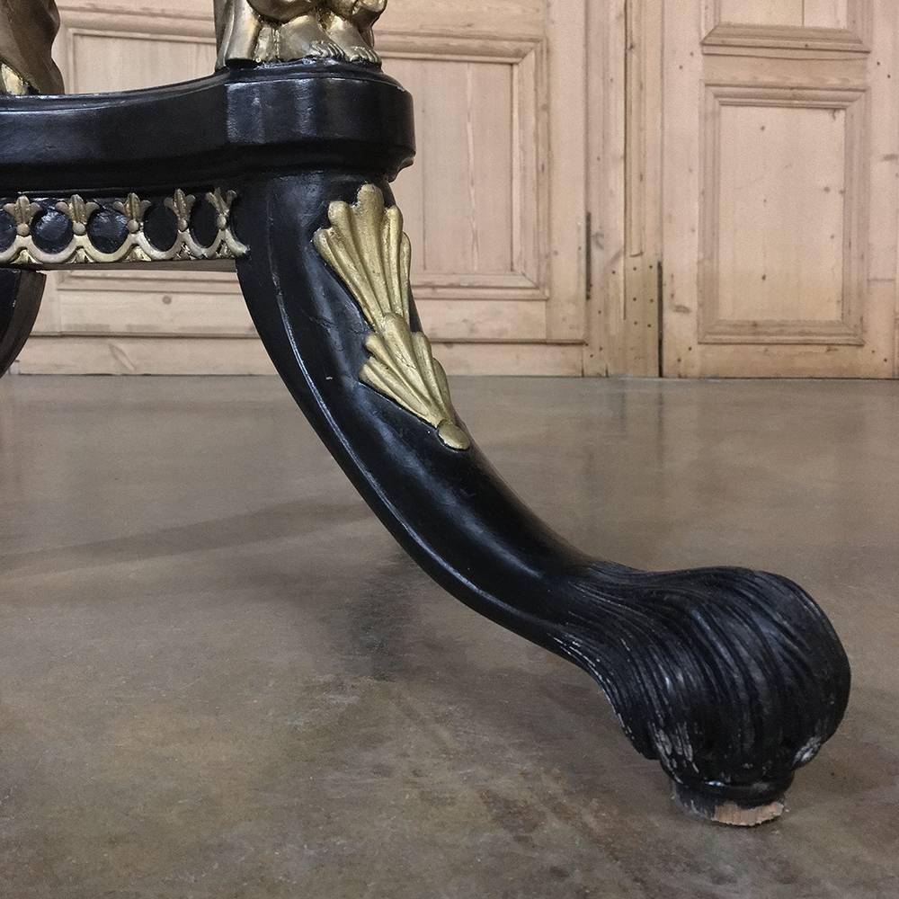 This 19th century second Empire caryatid Ebony Gilt centre table was handcrafted to perfection during the reign of Napoleon III, is a stunning example of the sculptor's art and the finisher's art, with a nod to the styles set forth by the Ancient