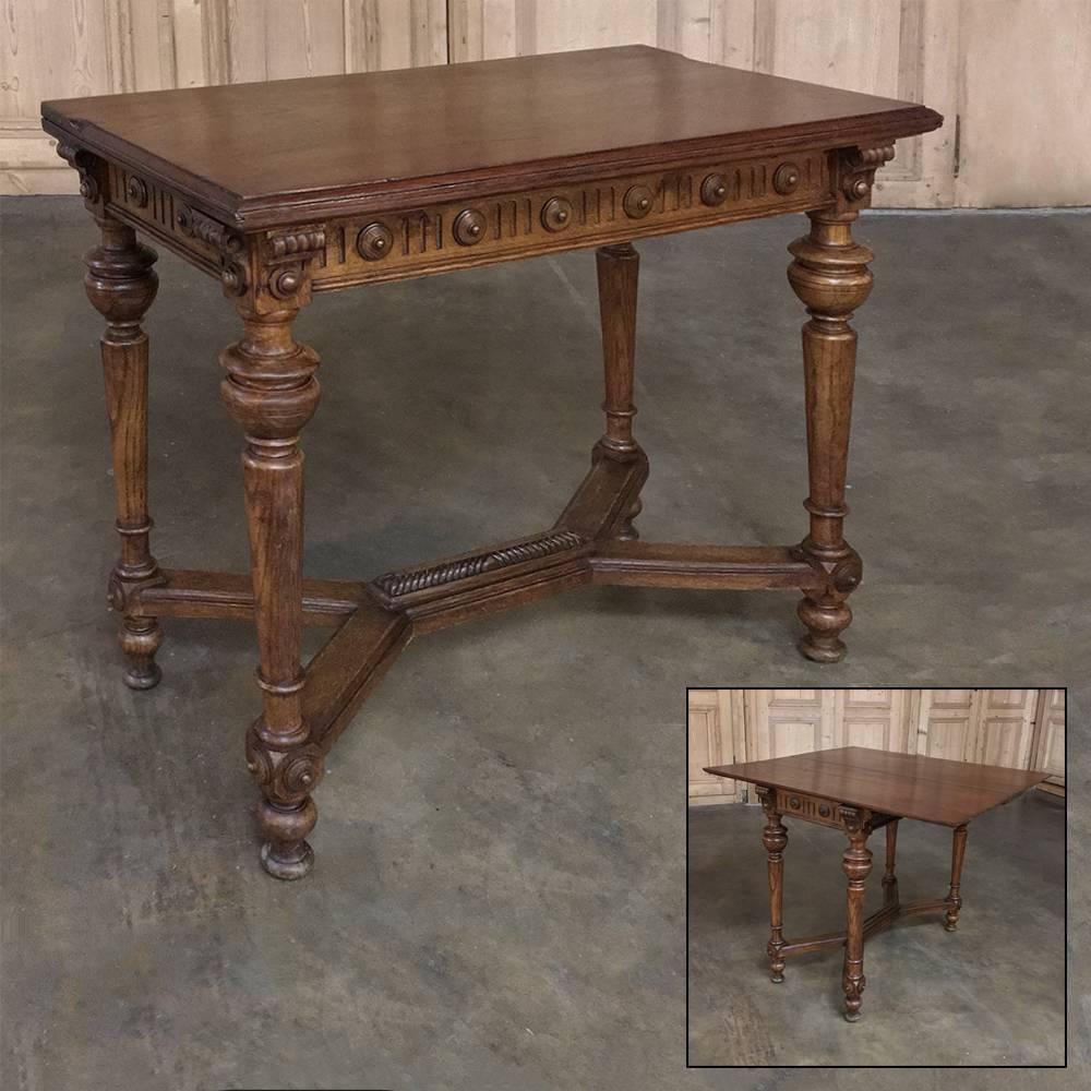 This 19th century French Henri II Oak game table represents a clever design that dates back centuries, wherein what appears to be a normal end table actually has a top that flips open to double in size, and create a spacious game playing surface for