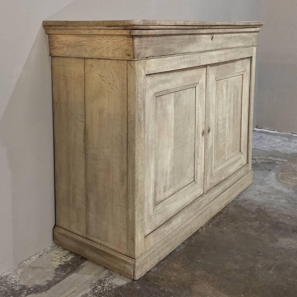 19th century French Louis Philippe stripped oak buffet is the essence of the style, with no carved embellishment, no bronze mounts, no marquetry or painted enhancements ~ just a tailored, functional and austere piece that affords a generous surface