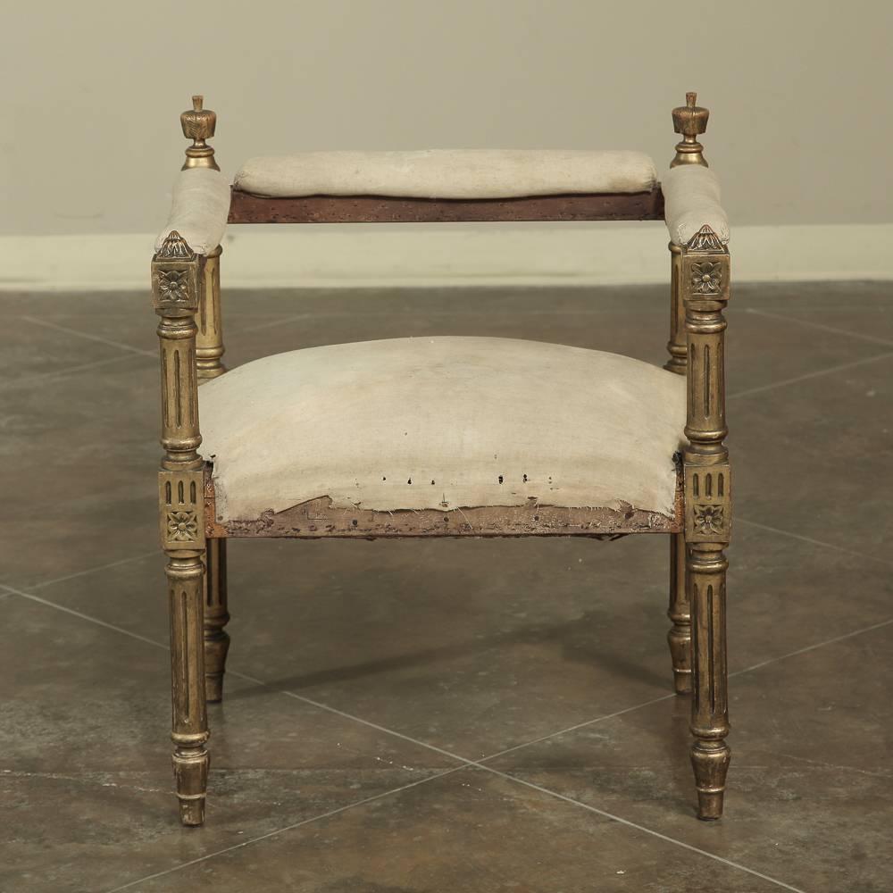 Fabulous and ideal for the vanity or dressing table, this antique French giltwood Louis XVI arm bench or stool is ready to upholster in your favourite fabric or to stay as deconstructed look!
circa 1890s
Measures 30 H x 24.5 W x 18 D, seat 19 H.