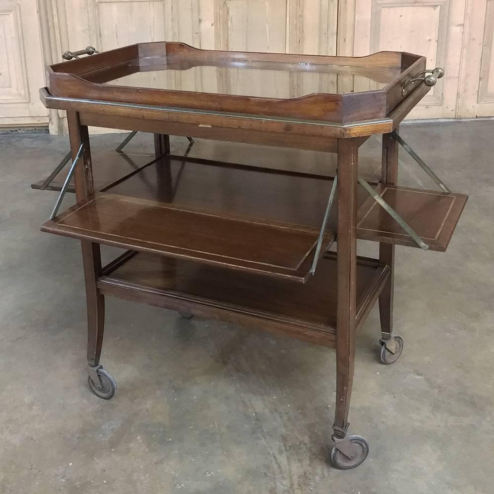 Antique tea serving or bar cart with removable glass tray was handcrafted from Fine imported mahogany and inlaid with satinwood yet has a tailored, understated elegance that makes it suitable for most any decor! Perfect as a bar cart with its lower