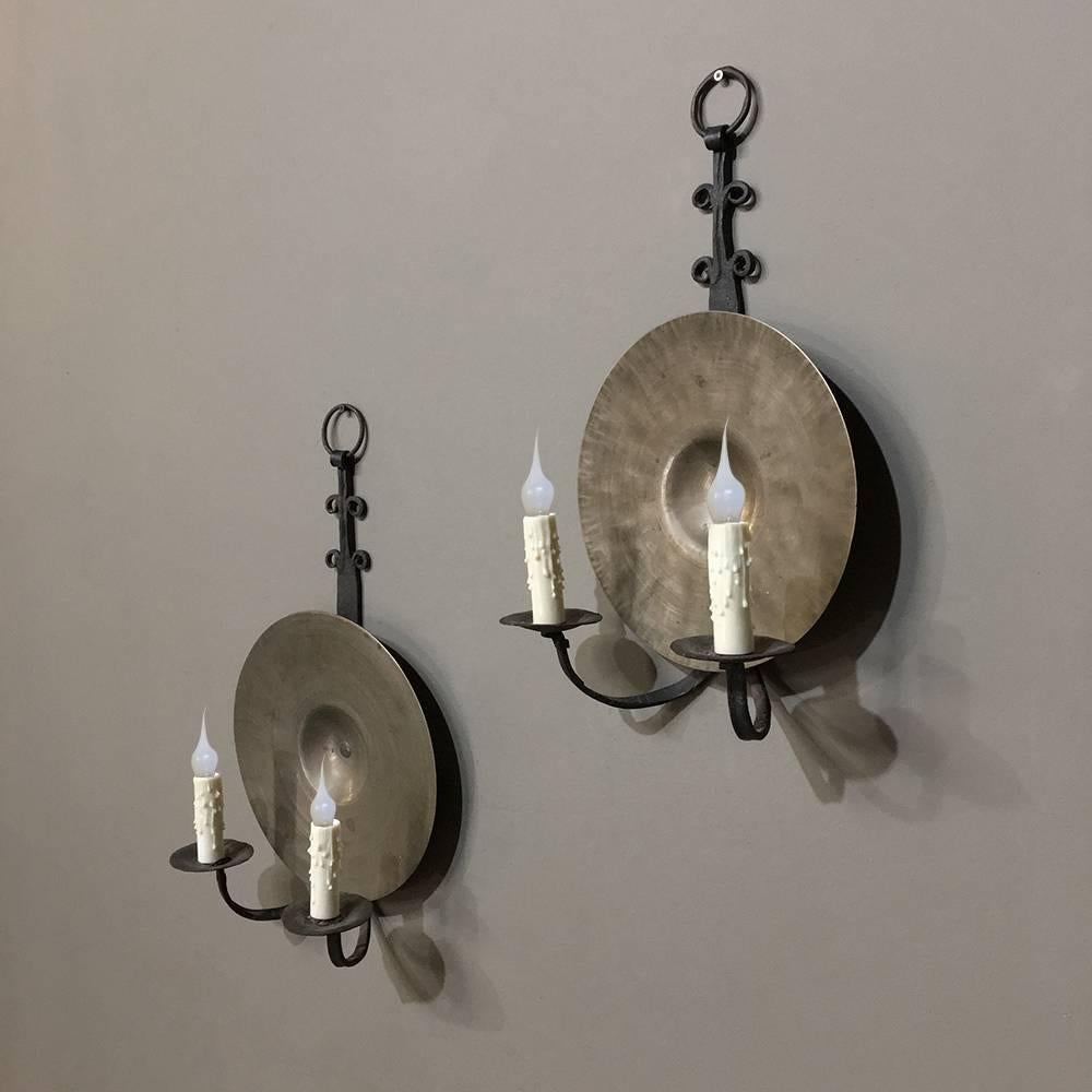 Pair of rustic Spanish wrought iron and bronze wall sconces were actually repurposed from a pair of parade cymbals, and are the perfect choice for a music-themed room or just as appealing rustic touch to your casual decor!
Priced unwired for wiring