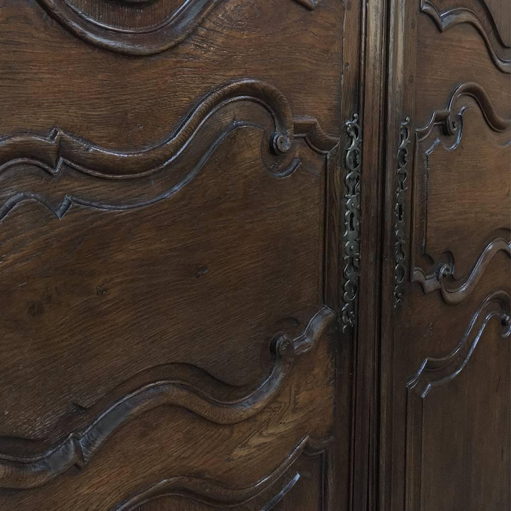Pair of 18th century country French oak armoire doors. Plaquards were salvaged from armoire doors as the doors were usually made from the finest wood and decorated accordingly, therefore imbued with more longevity. Commonly applied to the front of