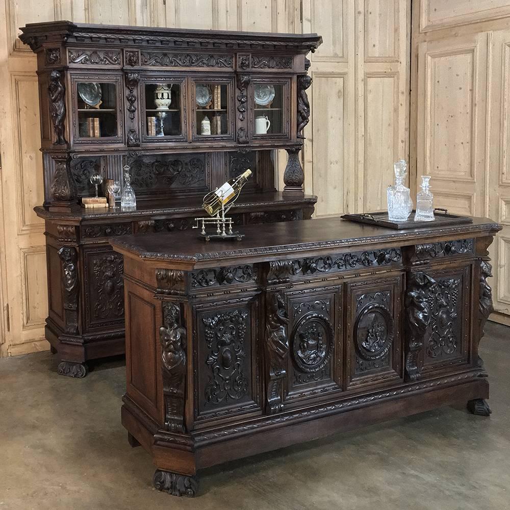 19th century, Italian Renaissance bar in hand-carved walnut is so superior to the expense and look of built-in assemblies, and you can take them with you when you move! Exquisite Old World craftsmanship abounds from the two-tiered back unit with