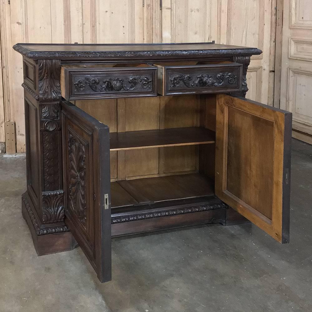 19th century Italian walnut Renaissance shallow buffet is the perfect answer for high-traffic areas or a room that needs a nice flat panel TV platform! Also a great choice as a credenza for the office, it has been sculpted from fine walnut with bold