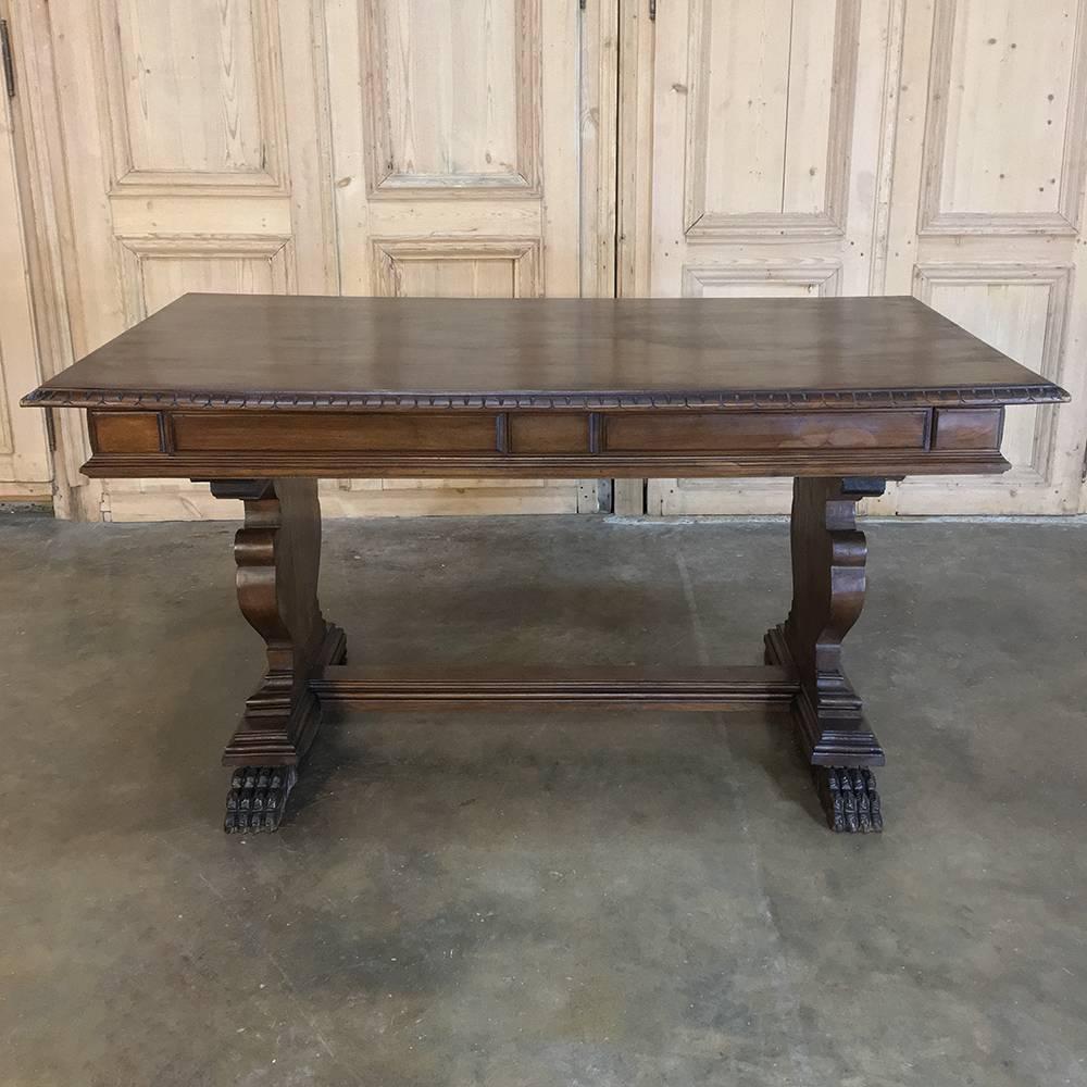 19th century Italian Renaissance walnut desk has a definite Tuscan feel to it, with classical design combined with lions' paw feet for a masculine effect. A pair of drawers is perfect for 21st century offices, with plenty of room on top for your