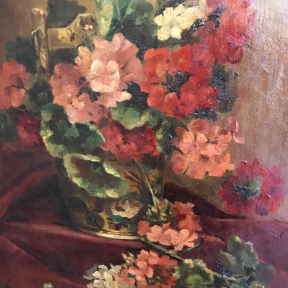 19th century framed oil painting on canvas dated 1898 is a splendid example of the Still Life genre. Colorful floral bouquet is rendered on a subtly lit background with shadowplay in the foreground, and the work survives in its original gilded