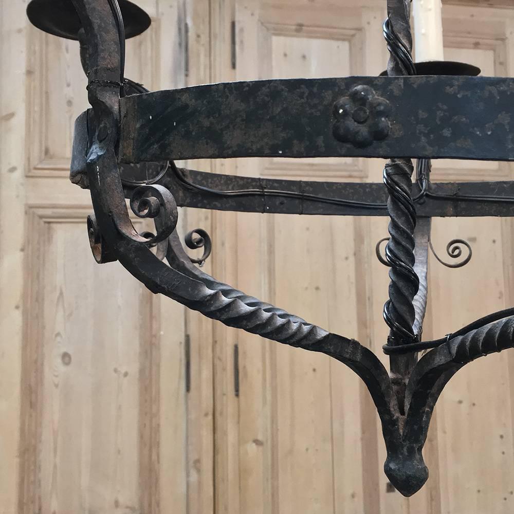 Late 18th Century Pair of 18th Century Hand Forged Wrought Iron Spanish Chandeliers, Electrified 