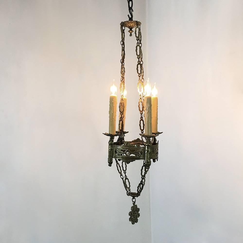 19th century French gothic brass chandelier was originally designed for candles, but has now been fitted with standard electrification, included in the price! Elaborate detail abounds from any viewing angle and the original pendant and suspension