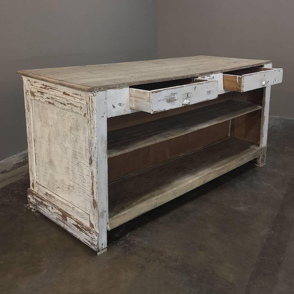 19th century distressed painted store counter or bar is ideal for today's casual decor, and will work as a kitchen island or a bar! Open on one side, its distressed, shabby chic look will add a rustic touch to your decor,
circa 1870s
Measures: 37