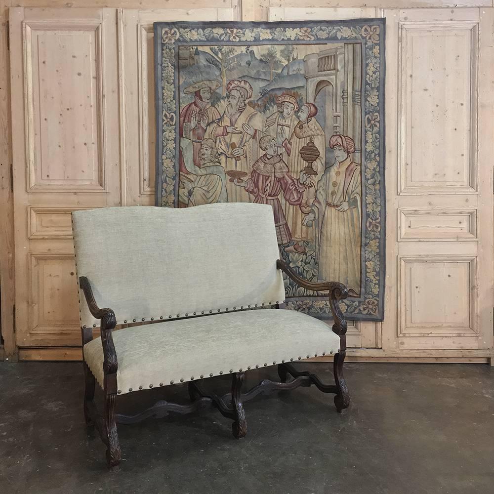 This large, 19th century Aubusson Renaissance tapestry depicts a Classic 15th century theme with noblemen and men of learning conversing in a scenic courtyard, giving us insight into the dress and customs of our ancestors from Europe. Was woven in