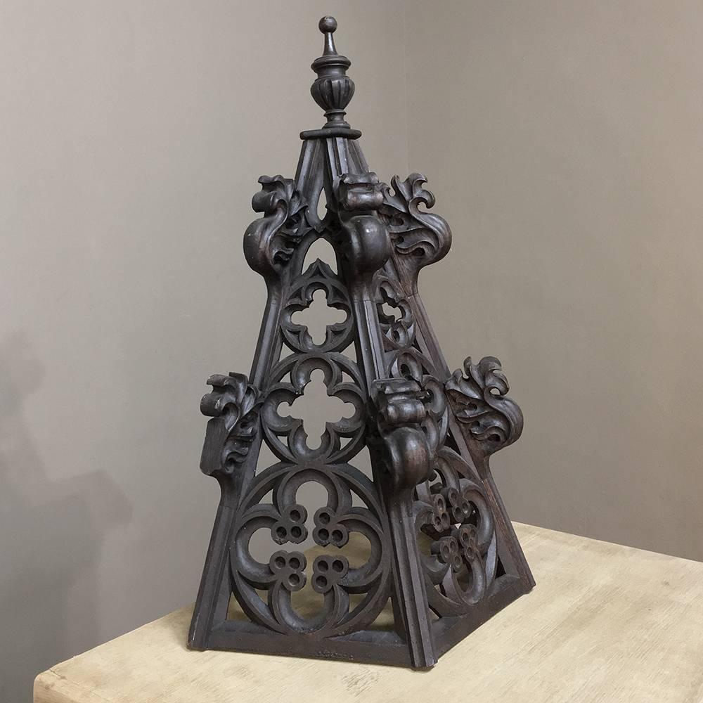 19th century Gothic carving, architectural fragment / finial features quatrefoils and elaborate scrollwork with a finial on top, perfect for providing an intriguing Old World accent for any room,
circa 1870s
Measures 27 H x 17.5 W x 9 D.