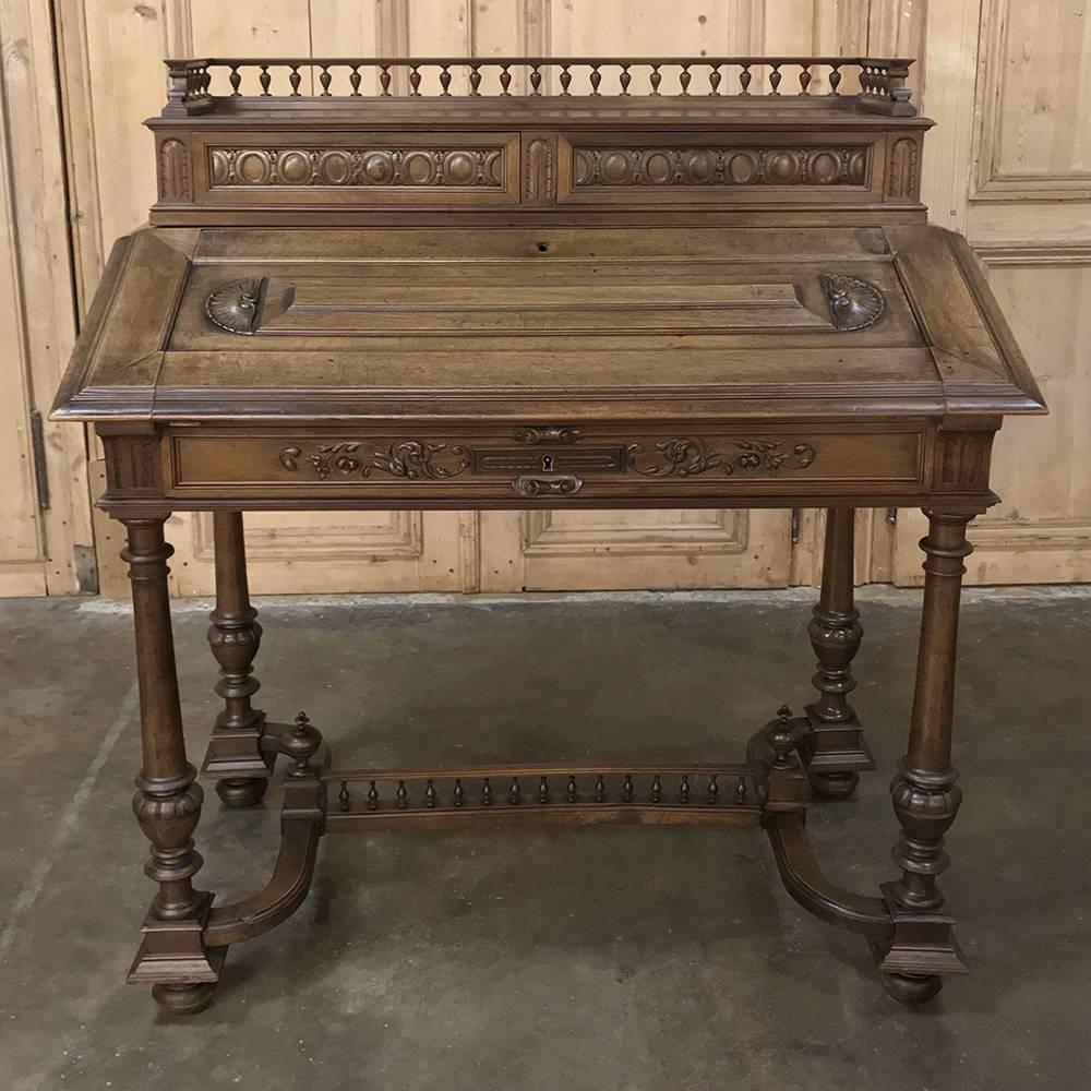 19th century French Henri II walnut secretary is an elegant way to provide a compact work station in any room! handcrafted from select French walnut, it features a spindle rail around the top to keep things in place stylishly, with four turned legs