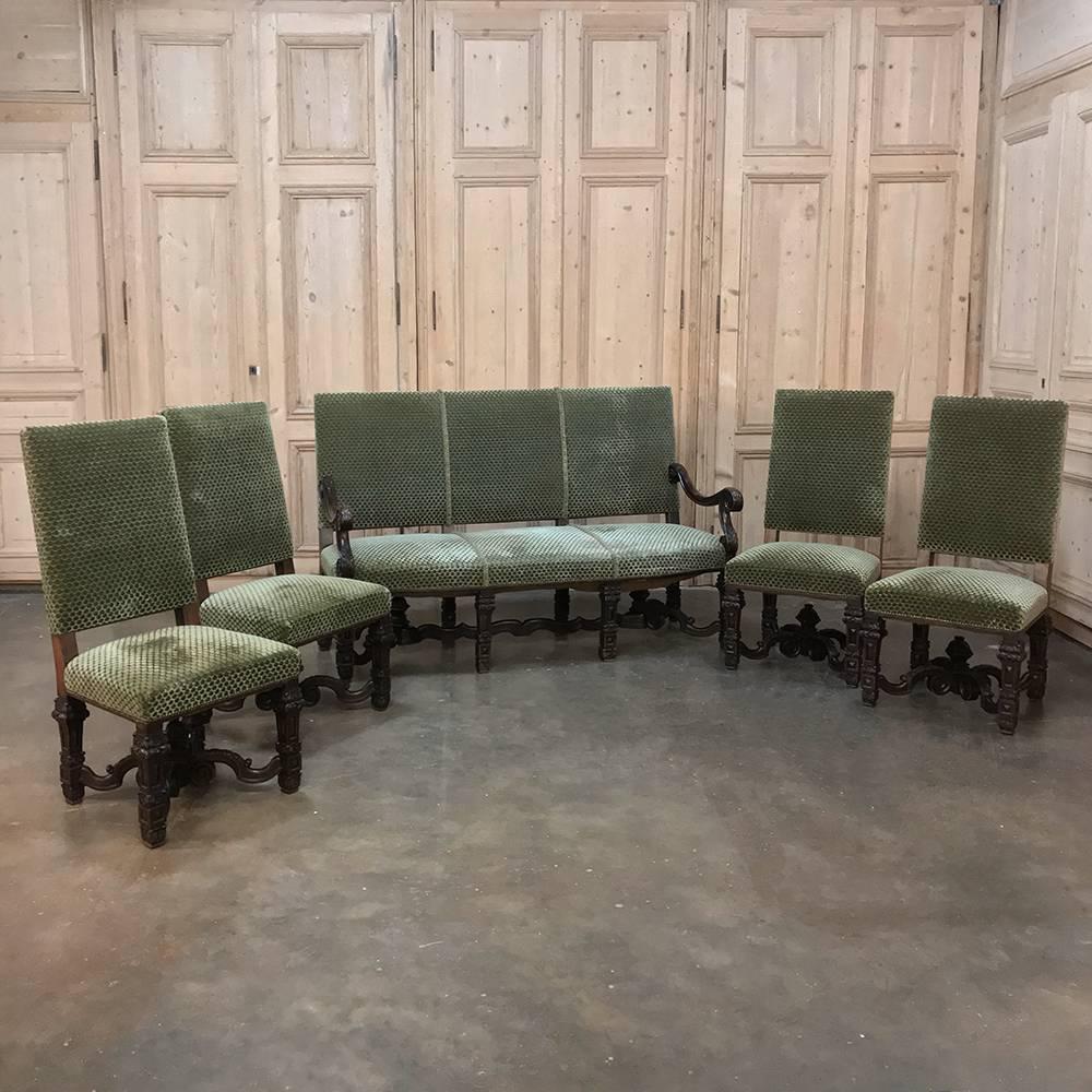 Set of four 19th century French Louis XIV chairs exudes the essence of regality, with amazing carved detail on the legs and connecting stretchers below. Spacious seatback and generous seat provide ample comfort for which the design has been