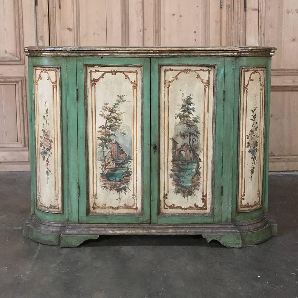 Antique Italian Florentine painted buffet features original hand-painted works of art in each of the panels across the facade, including the rounded sides. Such works are a trademark of the storied City-State, whose history dates back centuries
