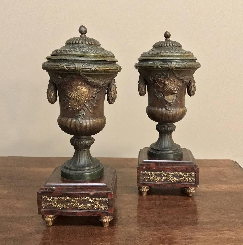 Wonderfully well preserved, this pair of 19th century French mantel urns were designed to adorn the mantel or buffet, or perhaps console in the foyer of a luxuriously appointed home during the Belle Époque,
circa 1890s
Each measures 14 H x 5 W x