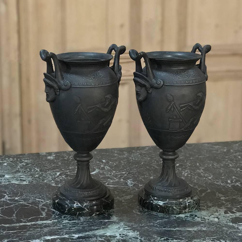 Pair of 19th century Spelter mantel urns on marble bases is wonderful choice for creating symmetry in your design plan. Classic shape is reminiscent of ancient Greek amphora which date back thousands of years,
circa 1880s
Each measures: 12 H x 7.5