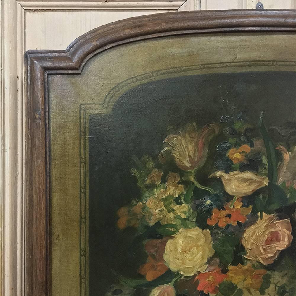 19th century framed oil painting on canvas is an excellent rendition of the classic still life in a classic setting with a spectacular floral bouquet in a Greek urn. The overall natural coloration emphasizing the color green provides a tranquil