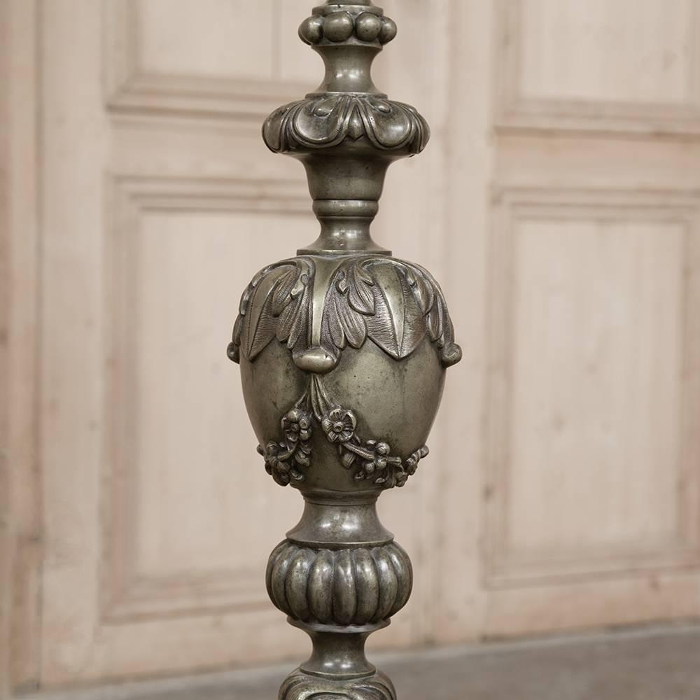 Amazing Antique Altar Candlestick in Renaissance Revival style was cast and hand chased in solid bronze in remarkable detail with the image of an angel. This lovely antique lighting was cleverly converted to an electric floor lamp and now new wiring