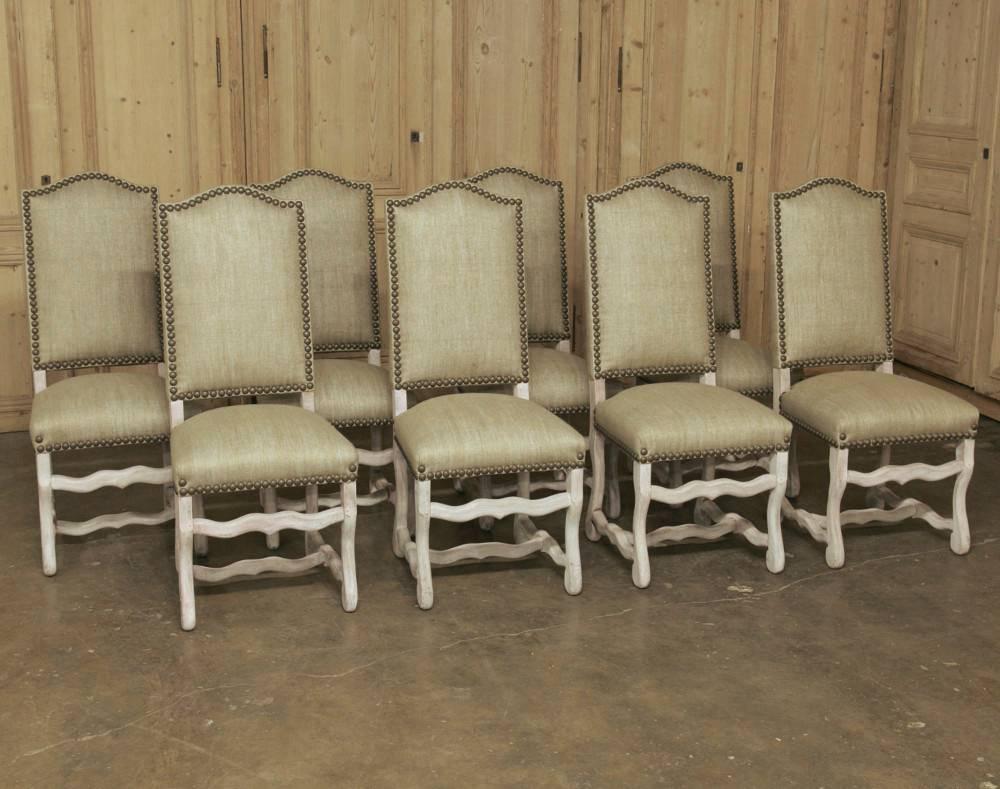 This set of eight Os de Mouton chairs, so named because of the leg's resemblance to that of a lamb, are truly a timeless design, working with just about any style of furniture that involves even a hint of Baroque or Rococo influence. Newly