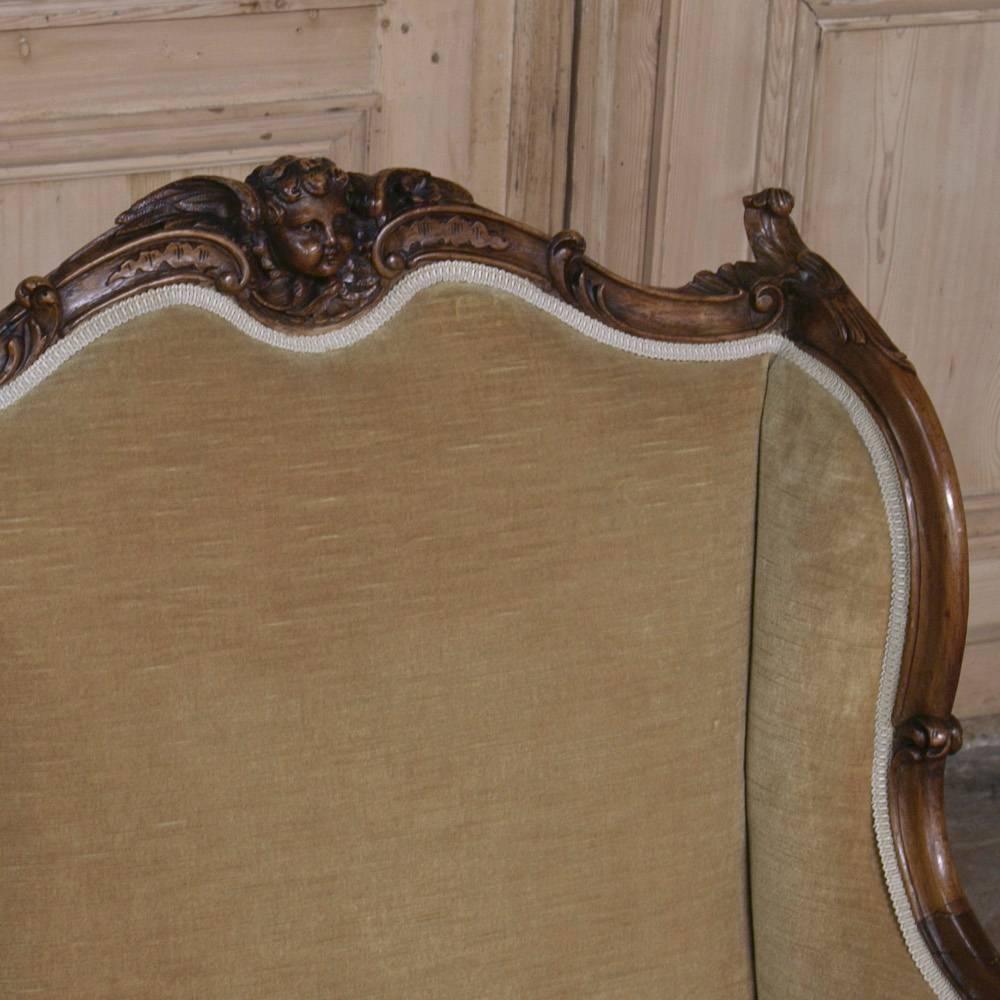 Hand-Carved Pair of 19th Century French Walnut Regence Armchairs Bergères