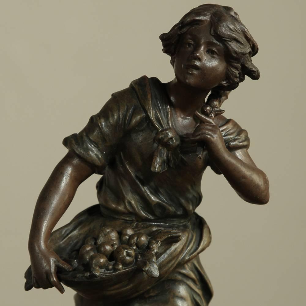 19th Century Mantel Clock on Onyx Base features a bronzed spelter statue by noted French sculptor Hippolyte Francois Moreau (1832-1927) entitled Maraudeuse (translated female marauder), winning him a gold medal for his efforts and immortality in the