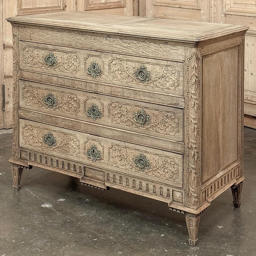 18th Century French Louis XVI Commode in Stripped Oak is a magnificent example of the genre, meticulously hand-crafted by master artisans in the neoclassical revival style from dense, old-growth oak.  The tailored rectilinear architecture recalls